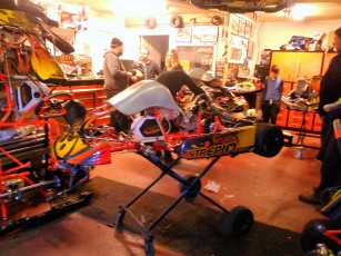 Assembling the kart with a Briggs & Stratton engine.